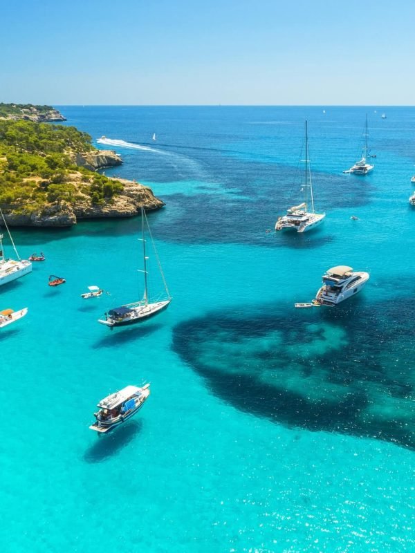 aerial-view-of-boats-luxury-yachts-on-the-sea-in-sunny-day-1.jpg